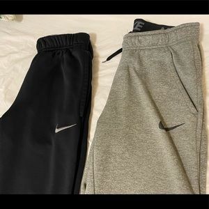TWO pairs of Nike gym sweatpants gray and black